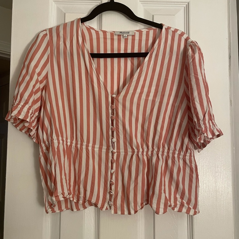 Short sleeved v neck peplum top